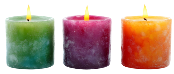 Three Colorful Pillar Candles With Lit Flames Against a Transparent Background
