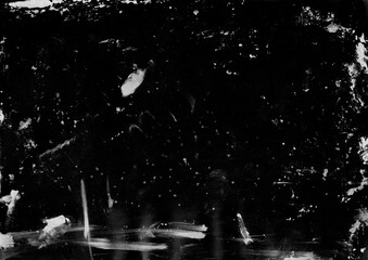 Abstract grunge background with white scratches. Black and white paint texture. Dusty particle on dark backdrop.