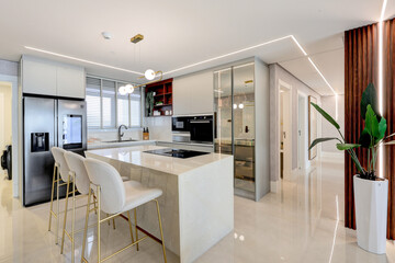right Minimalist Kitchen with Central Island and Bar Seating