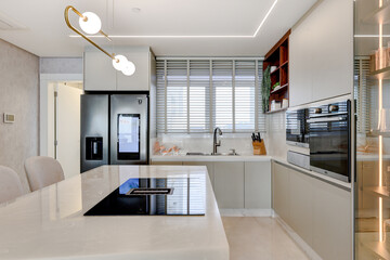 right Minimalist Kitchen with Central Island and Bar Seating