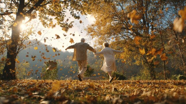 Joyful elderly couple dancing among falling leaves in an autumn park, surrounded by vibrant foliage and warm sunlight