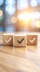 Three wooden blocks with checkmarks