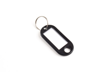 Black plastic key tag isolated on white background