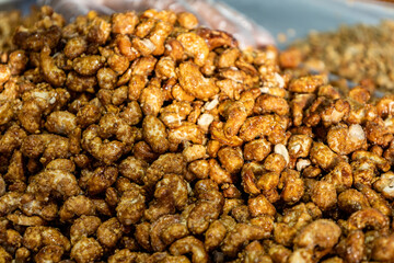 Candied peanuts close-up in street market.