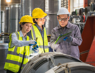 Leader manager talk work order staff engineer technician team in hard hat and uniform safety vest...