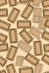 Vintage film strips scattered across a light background retro cinema