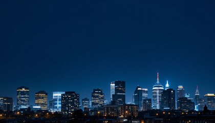 Fototapeta premium Stunning Nighttime Skyline Panorama of a Modern City Illuminated Buildings and Dark Blue Sky