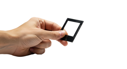 Hand holding old 35mm slide frame isolated PNG with Transparent Background