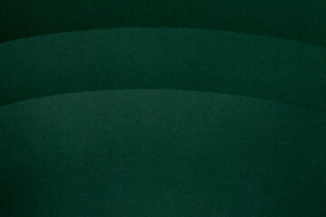 ざらざらの紙と曲線　暗い緑色