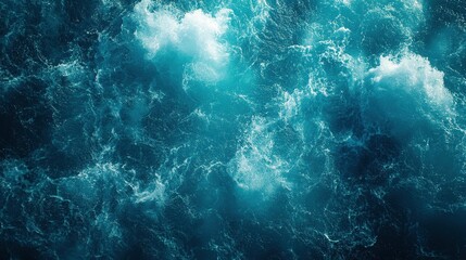 Obraz premium Turquoise water surface with foamy waves.