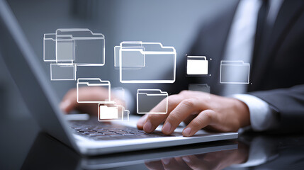 Document management system DMS. Folder structure and classification system. File and folder icons. Businessman using laptop computer for controlling document versions.