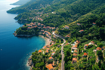 Aerial View of Coastal Village Nestled Between Ocean and Green Hills