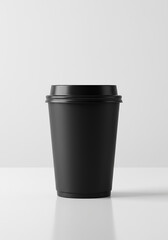 Matte black paper coffee cup with lid on white surface