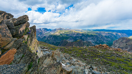 Dramatic Alpine Vista from Beartooth Pass Summit in Montana and Wyoming - a high mountain pass in the Rocky Mountains, it's known for its stunning scenery, glacial lakes, and rugged mountain peaks