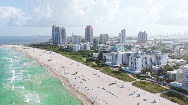 Aerial View of Miami South Beach, Florida USA, Beachfront Buildings and Turquoise Sea, Establishing Drone Shot