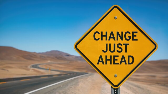 Navigate the future with confidence, a road sign signals change just ahead in a vast desert landscape