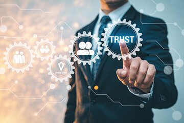 Businessman s finger touching a gear with the word trust symbolizing teamwork and partnership in business
