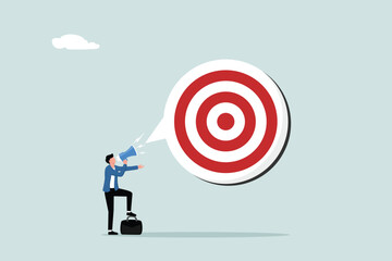 Announce new year goal, resolution or business objective, target or purpose, motivation to success or challenge, business agenda concept, businessman announce new goal or target with megaphone.