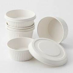 White ribbed paper ramekins with lid on white background