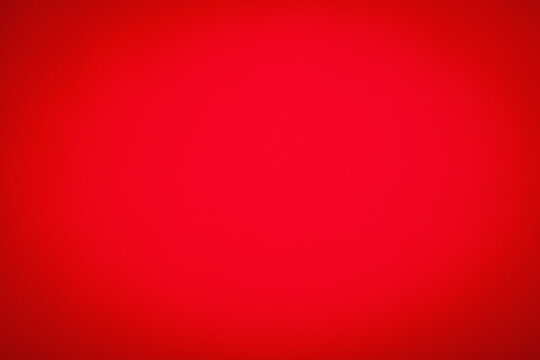 Intense red background with subtle vignette for creative designs