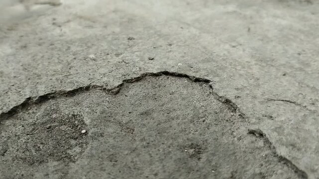 Concrete surfaces are peeling or spalling. due to extreme weather