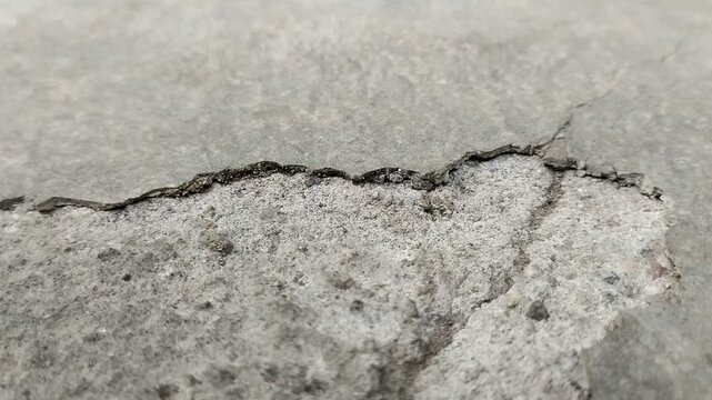 Concrete surfaces are peeling or spalling. due to extreme weather