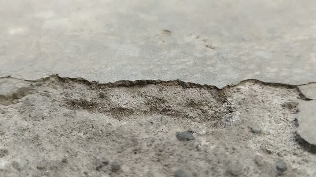 Concrete surfaces are peeling or spalling. due to extreme weather