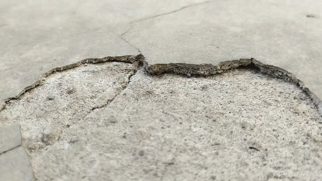 Concrete surfaces are peeling or spalling. due to extreme weather
