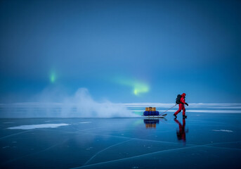 Aurora Borealis Expedition A Lone Explorer Pulling a Sled Across a Frozen Lake Under the Northern Lights