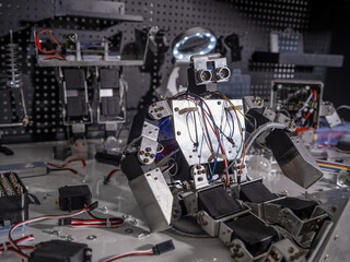 A robot is on the workbench