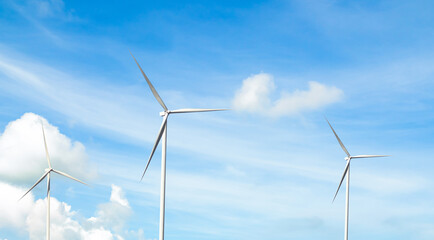 Wind mill power energy farm generator renewable sustainable field on blue sky, environment eco...
