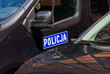 Polish police car with the "Policja" sign on the door, photographed during Police Day in Bydgoszcz. © Adam