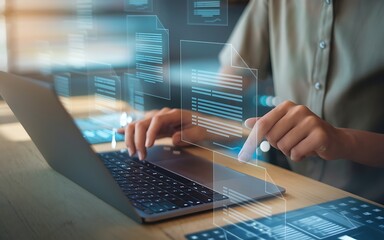 Person interacting with digital documents on laptop and tablet