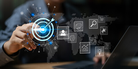 Businessman showing concept of setting business goals ,Target Growth development planning ,Improving marketing strategies and business objectives ,Target customers ,Achieve Goals ,Success