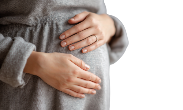 Close-up of a pregnant woman's belly, with her hands resting on her stomach against a white background. The focus is on her hand. Transparent background