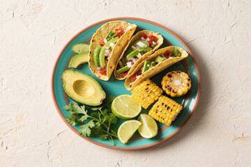 Vibrant tacos with avocado corn lime cilantro image