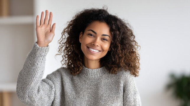 single person stands confidently raising their hand in gesture of support and empowerment