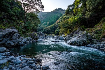 Serene mountain river flowing through lush green valley