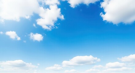 Bright Blue Sky with Fluffy White Clouds on a Clear Day