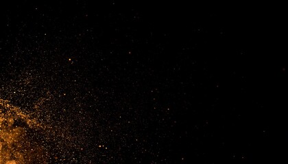 Abstract burst of orange particles on black background