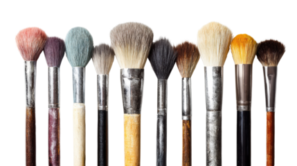 Various makeup brushes arranged in a row, perfect for beauty and cosmetics themes.