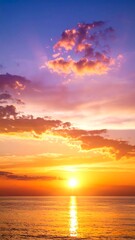 Fototapeta premium Vibrant sunset over ocean