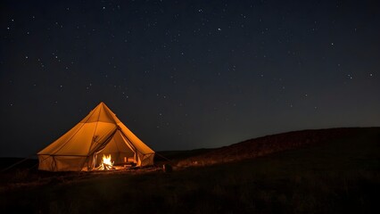 Single Glowing Fire in a Tent on a Hilltop at Night