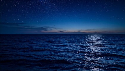 Starry night over tranquil ocean