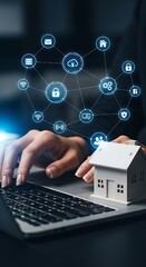 A person uses a laptop to manage a smart home network, connecting various IoT devices for security and automation.