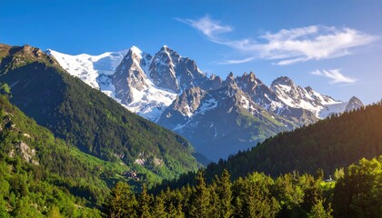 Majestic snow-capped mountains against a vibrant blue sky in the summer
