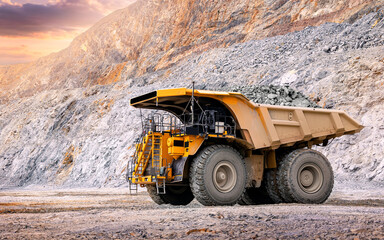 Open pit mine industry, big yellow mining truck for gold ore, banner.