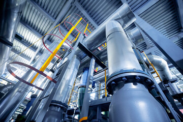 Concept background industrial factory zone. Steel pipelines, valves and ladders modern gas power...