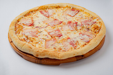 Enjoy a perfectly baked pizza topped with savory ham and rich cheese to satisfy your hunger
