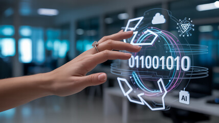 A close-up photograph of a hand interacting with a digital holographic interface.